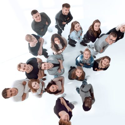 top view. lots of diverse young people looking up. photo with copy space